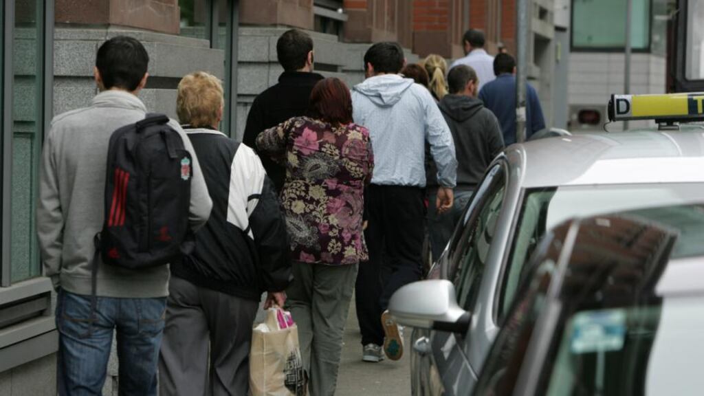 A queue for unemployment benefit outside Bishop Street social welfare office in Dublin. Photo: Frank Miller/The Irish Times