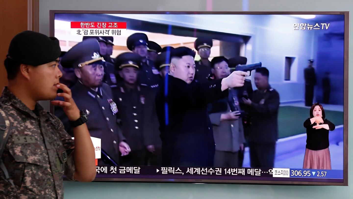 South Koreans watch a television displaying news broadcasts reporting on North Korea at a station in Seoul. Photograph: Jeon Heon-Kyun/EPA