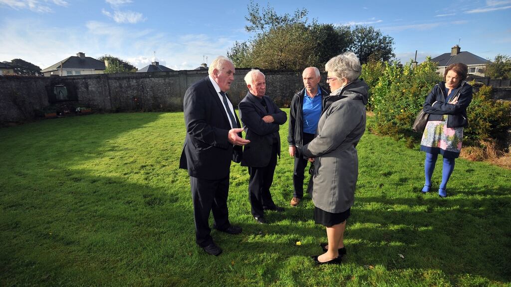 Tom Warde, Loughrea, Walter Francis, Athenry and P.J. Haverty speak to Minister Katherine Zappone at the site of the Tuam Mothers and Baby home. Photo: Ray Ryan