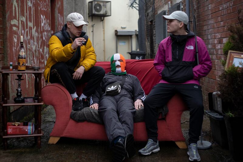 Naoise Ó Cairealáin aka Móglaí Bap (left), DJ Próvaí (centre) and Mo Chara of Kneecap. Photograph: Paulo Nunes dos Santos for The New York Times