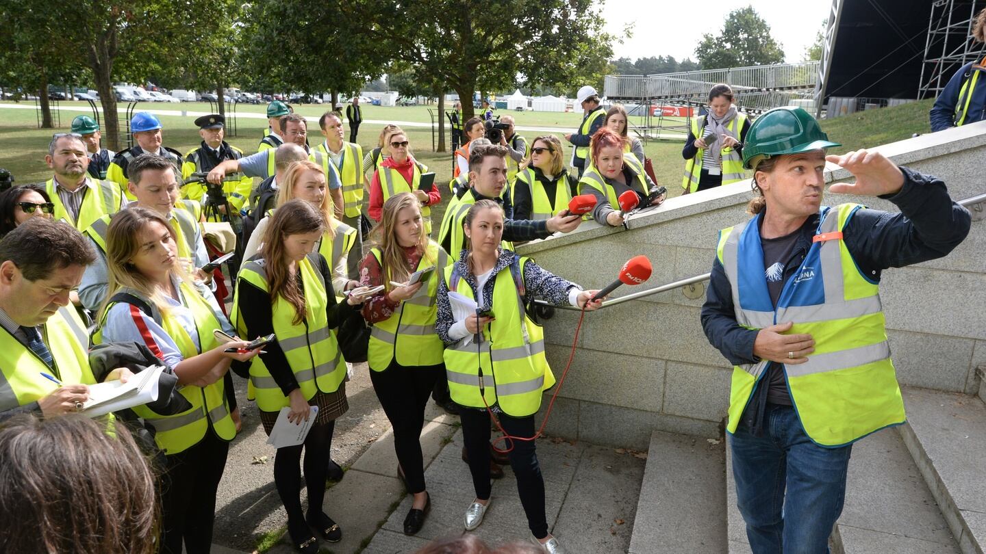 Johnny Donnelly, artistic director speaking about the design around the altar to media during a visit to the site for an informal briefing on arrangements in the Phoenix Park for Mass with Pope Francis. Photograph: Dara Mac Dónaill