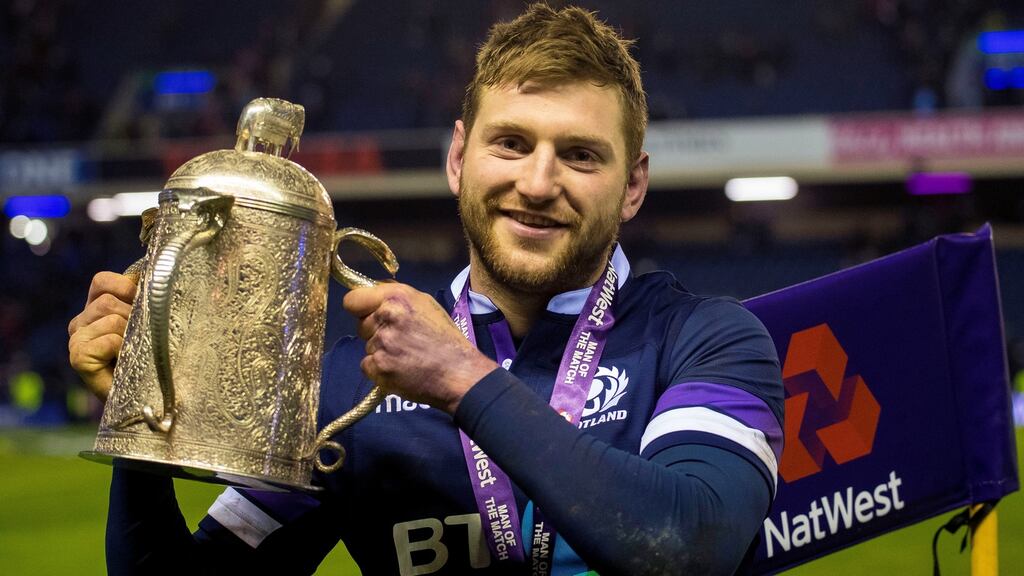 Finn Russell with the Calcutta Cup. Photograph: Craig Watson/Inpho