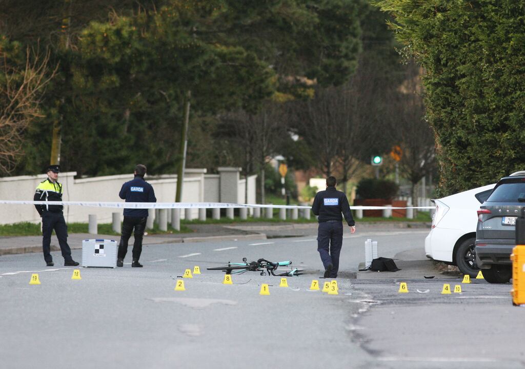 Gardaí at the scene of the incident between a car and a cyclist in Kinsealy, Dublin, on Sunday after which the cyclist died. Photograph: Padraig O'Reilly