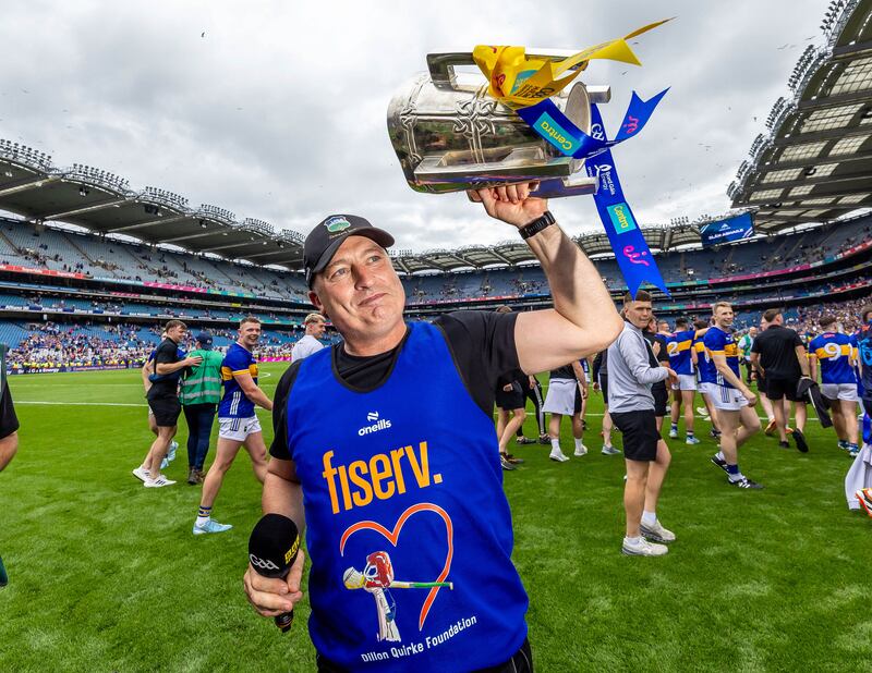 Tipperary manager Liam Cahill celebrates with the Liam MacCarthy Cup. Photograph: Morgan Treacy/Inpho