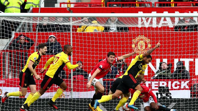 Troy Deeney scores for Watford at Old Trafford before it was disallowed by VAR. Photo: Clive Brunskill/Getty Images