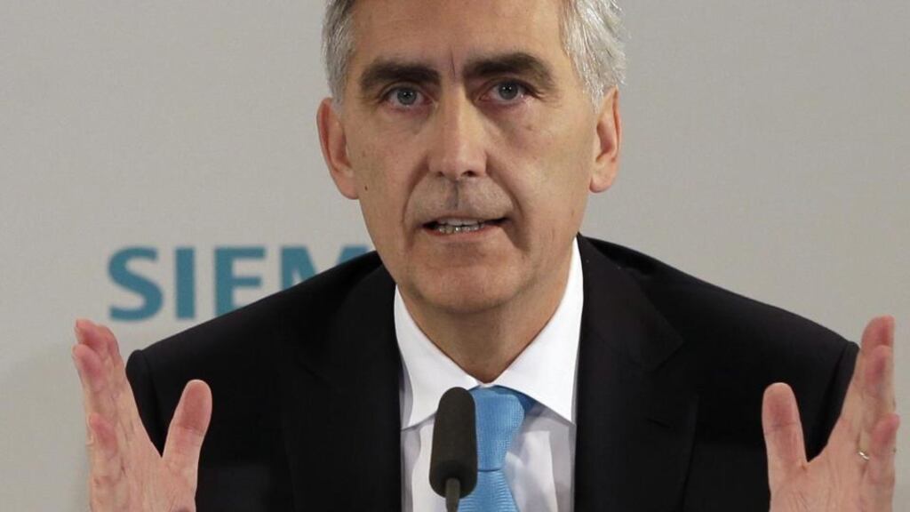 Peter Loescher, appointed in 2007 to clean up Siemens after the biggest corruption scandal in German history, last Thursday cut a profit forecast for the fifth time in his six-year tenure. Photograph: AP Photo/Matthias Schrader