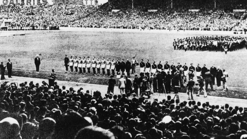 The Italian and Hungarian football teams line-up ahead of the 1938 World Cup final. Photograph: Hulton archive/Getty