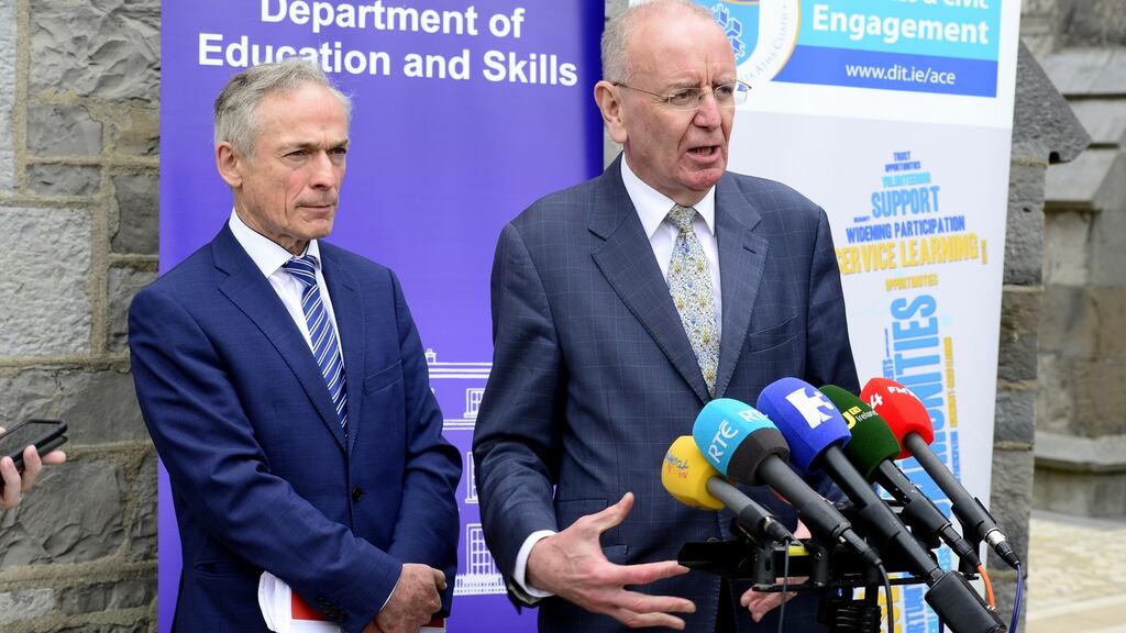 Minister for Education Richard Bruton and  Peter Cassells, chairman of the expert group on future funding for higher education, speaking recently at DIT.   Photograph: Cyril Byrne