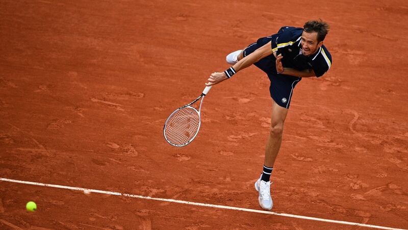Russia’s Daniil Medvedev serves the ball to Reilly Opelka of the US during their men’s singles third-round match at the French Open. Photograph: Anne-Christine Poujoulat/AFP via Getty Images