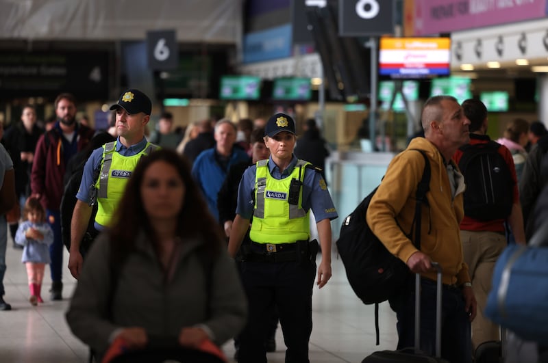 Garda Peter Mullins and Garda Debbie Burnett on duty at Dublin Airport. Photograph: Dara Mac Dónaill