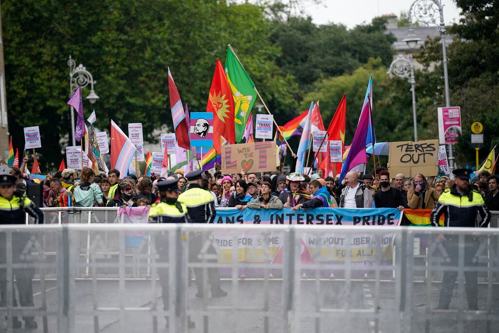 A placard bearing an image of Vladimir Lenin is held aloft among counter-protesters at the Let Women Speak rally in Merrion Square in Dublin last weekend. Photograph: Niall Carson/PA Wire
