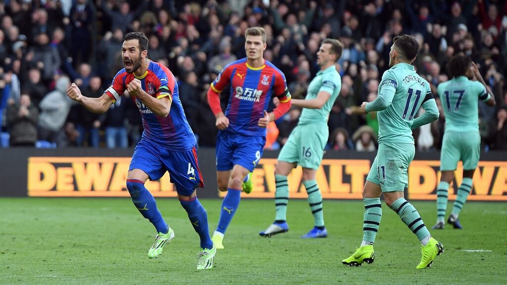 Luka Milivojevic celebrates his equalising penalty against Arsenal. Photograph:  Mike Hewitt/Getty
