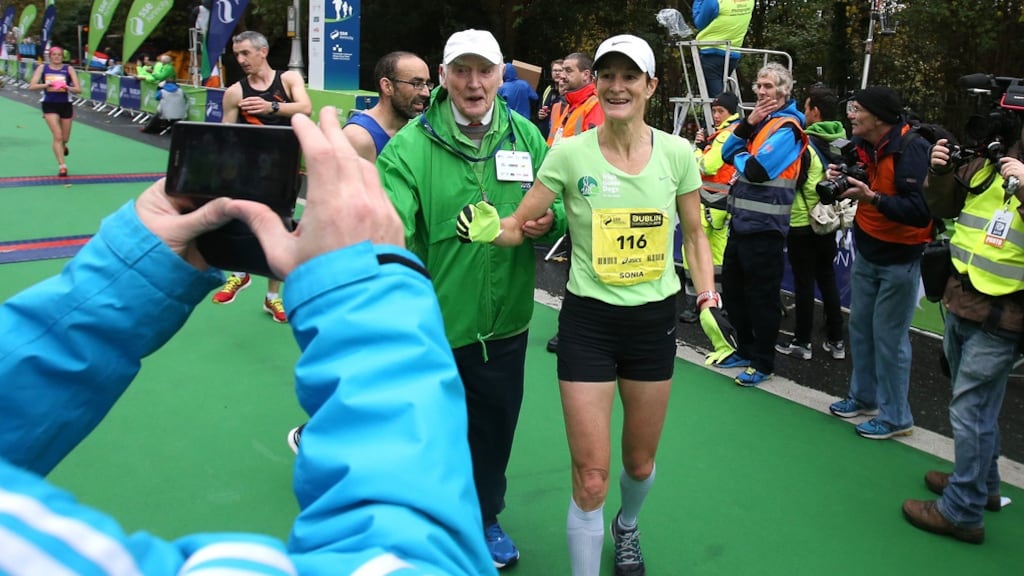 Sonia O’Sullivan enjoying the moment after completing the Dublin City Marathon in 2015. Photograph: Cathal Noonan/Inpho