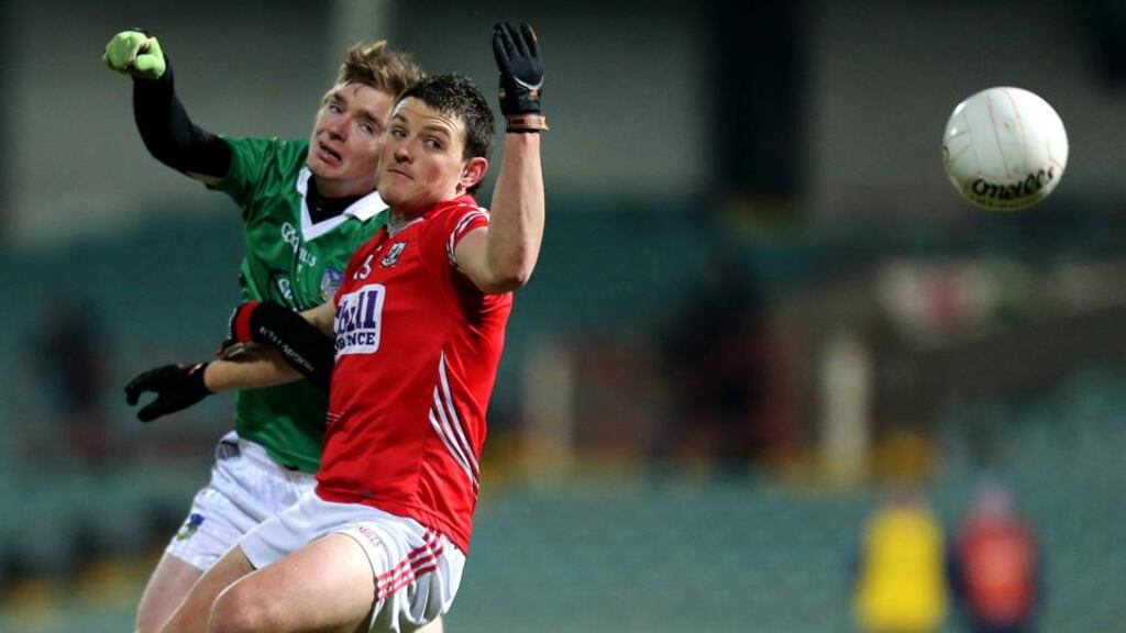 Limerick’s Brendan McCarthy and Dan McEoin of Cork in action at the Gaelic Grounds. Photograph: Inpho