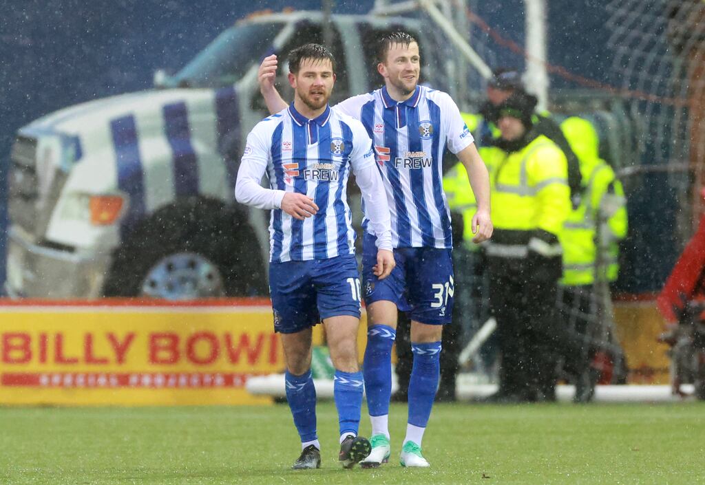 Kilmarnock's Matty Kennedy (left) celebrates scoring his side's second goal during the Scottish Premiership match against Celtic at Rugby Park. Photograph: Steve Welsh/PA Wire
