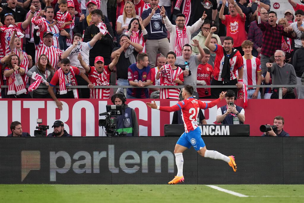 Portu celebrates scoring his team's second goal during the La Liga match against Barcelona at Montilivi Stadium in Girona. Photograph: Alex Caparros/Getty Images