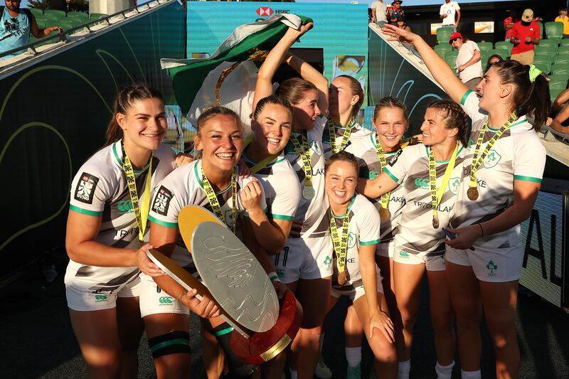 Ireland players celebrate with the trophy after the victory over Australia in the Sevens final in Perth, Australia. Photograph: Paul Kane/Getty Images