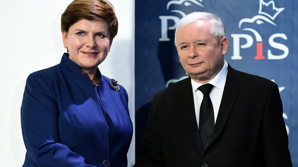 Poland’s prime minister Beata Szydlo and PiS party leader Jaroslaw Kaczynski: the new conservative government has taken control of the  country’s top court and secret services. Photograph:  Janek Skarzynski/AFP/Getty Images