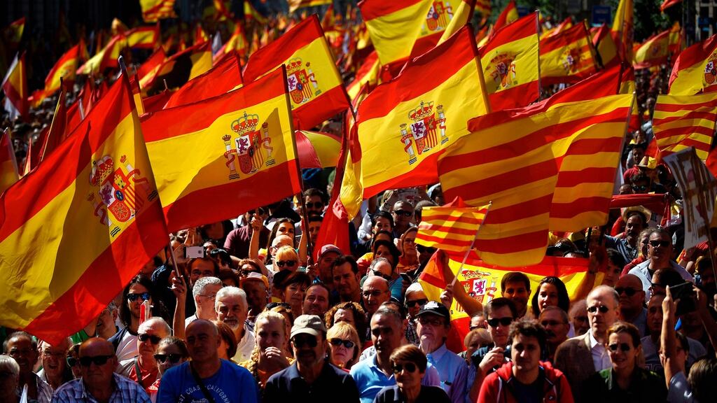 Protesters hold Spanish flags during a demonstration in Barcelona on Sunday called by “Societat Civil Catalana” (Catalan Civil Society) to support the unity of Spain. Photograph: Jorge Guerrero/AFP/Getty Images