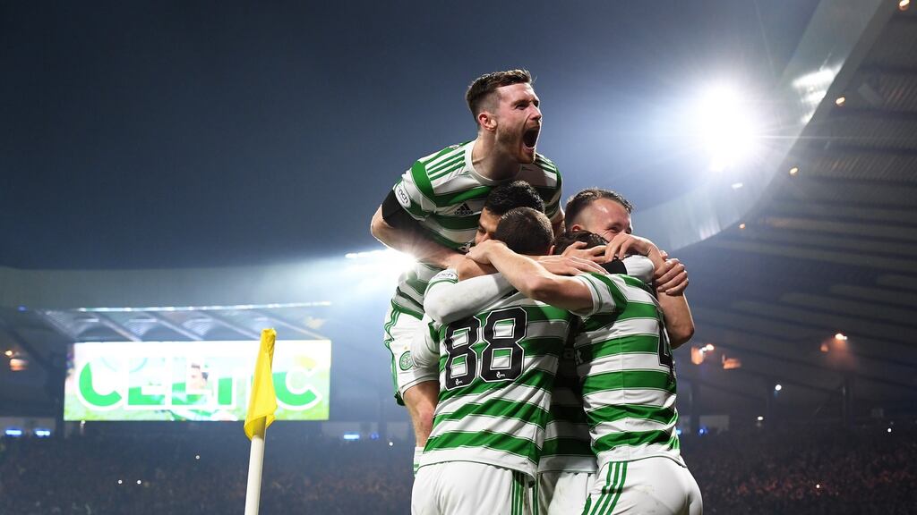 Celtic celebrate James Forrest’s winner in the League Cup semi-final against St Johnstone at Hampden Park. Photograph: Mark Runnacles/Getty