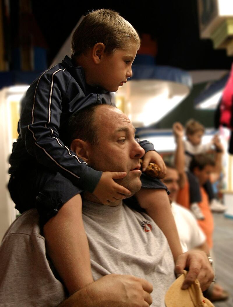 Michael Gandolfini on his father’s shoulders in 2004. Photograph: Brian Ach/Getty