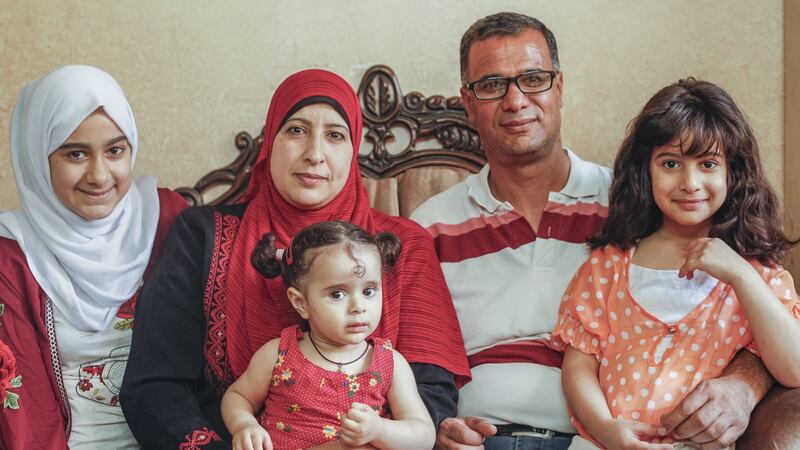 Sadya Khateeb with her family: The 43-year-old woman was born and raised in the West Bank camp
