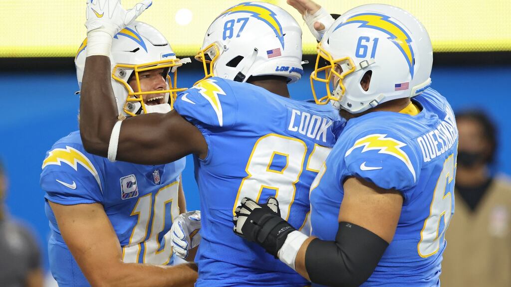 LA Chargers tight end Jared Cook celebrates his touchdown with teammate Justin Herbert during the win over the Las Vegas Raiders. Photo: Harry How/Getty Images
