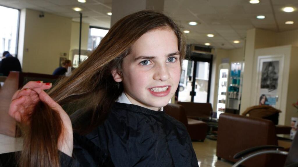Mane event: Amy Kerr (12) from Limerick donated her cut hair to the Rapunzel Foundation. Photograph: Liam Burke/Press  22