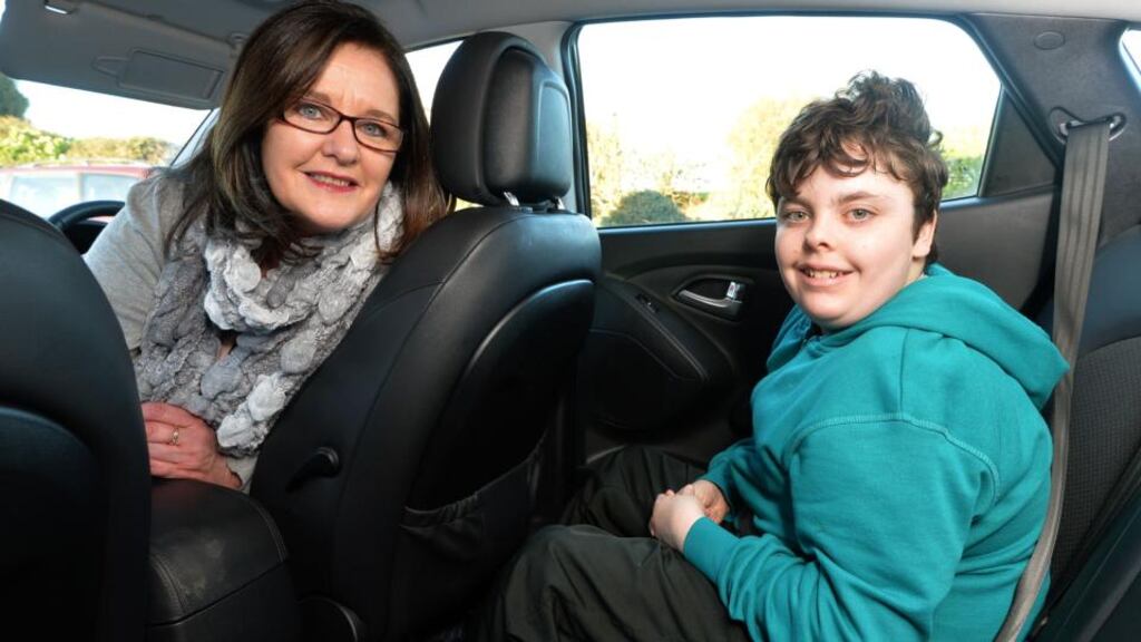 Jo Flood with her 13-year-old son, Harrison, at their home near New Ross, Co Wexford. Photographs: David Sleator