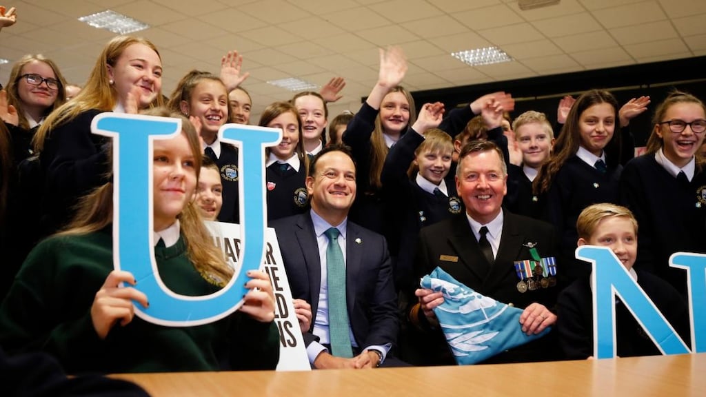 Taoiseach Leo Varadkar and Defence Forces chief of staff vice-admiral Mark Mellett with Ringsend College students at the launch of the Global Schools programme on Wednesday. Photograph: Nick Bradshaw