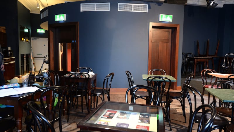 The set-up in the theatre is just as before: chairs and tables, but some now have glass tops with memorabilia beneath. Photograph: Dara Mac Dónaill/The Irish Times