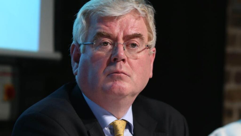 Tánaiste Eamon Gilmore: “I think there is a responsibility on the Orange Order to think about taking people onto the streets in situations where the tensions are already very high.” Photograph: Niall Carson/PA Wire