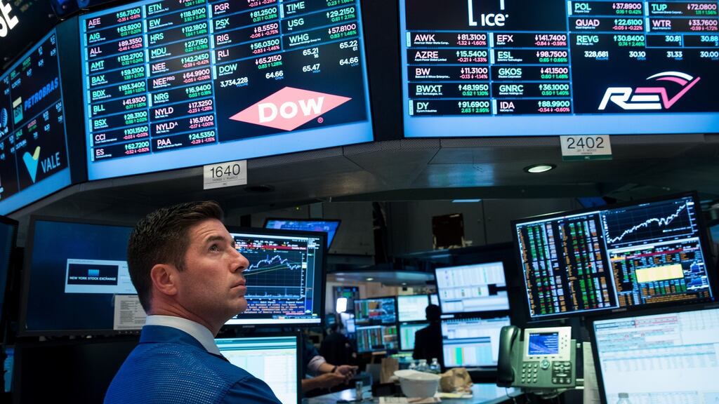 US stocks extended their losses in early afternoon trading on Tuesday, slipping from record levels, as a sharp drop in oil prices squeezed energy stocks and a rebound in technology shares faded out. Photograph: Drew Angerer/Getty Images