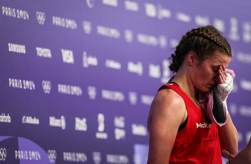 Ireland's Grainne Walsh dejected after her defeat to Hungary's Anna Luca Hamori in Paris. Photograph: Ryan Byrne/Inpho
