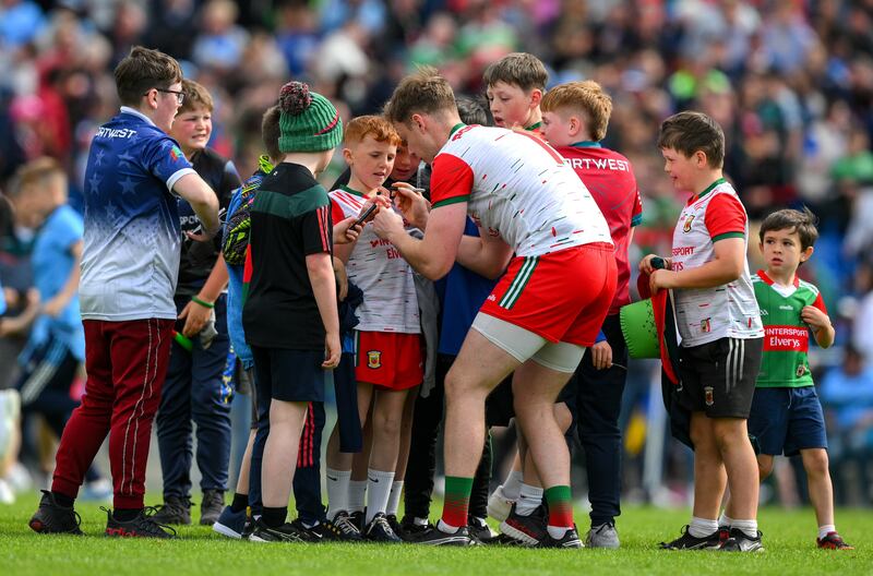 Young Mayo supporters wait to meet goalkeeper Colm Reape after a dramatic draw against Dublin in Roscommon. Photograph: Ray McManus/Sportsfile