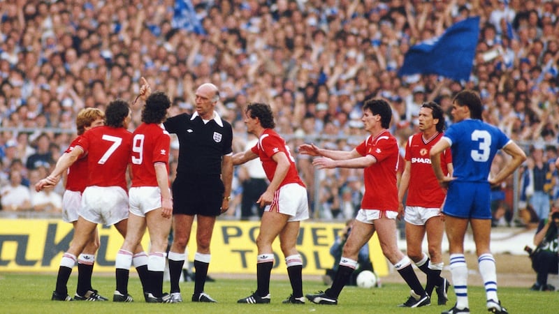 Kevin Moran of Manchester United, and formerly of UCD, is sent off during the 1985 FA Cup final. Photo: David Cannon/Allpsort/Getty Images