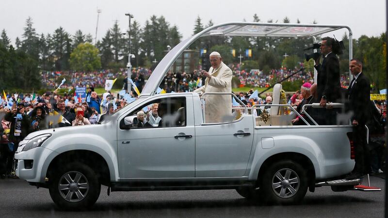 Pope Francis waves to the crowds during his visit to Knock Shrine on Sunday. Photograph: Maxwell Photography/Getty Images