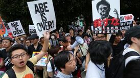 Japan passes controversial change in pacifist stance