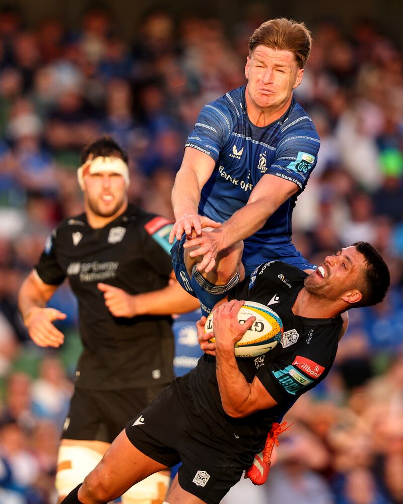 Leinster's Jordie Barrett competes in the air with Adam Hastings of Glasgow Warriors during last month's URC clash in Dublin. Photograph: Ben Brady/Inpho