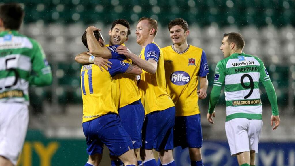 Dundalk’s Richie Towell celebrates with team-mates after his first penalty. Photograph: Donall Farmer/Inpho