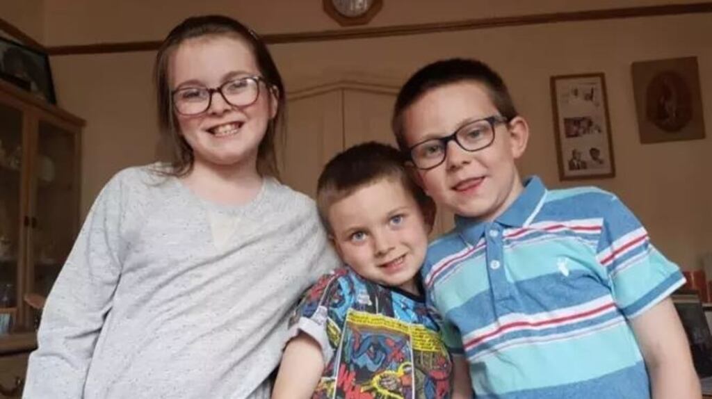 Handout photograph of Cara (10), Hagen (6) and Micheal Quinn (9). Photograph: Metropolitan Police