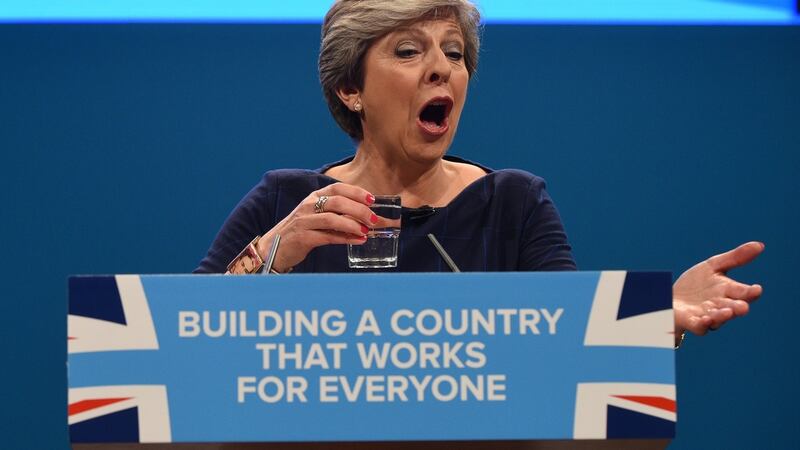Britain’s prime minister Theresa May. Her address was painful to watch, and almost impossible to listen to what she was saying rather than waiting for the next coughing fit. Photograph: Facundo Arrizabalaga/EPA
