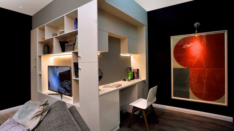 If the living room is the only area you have available, bespoke joinery can work really well.