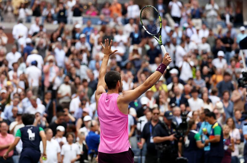 Carlos Alcaraz gestures to the crowd at Flushing Meadows after defeating Novak Djokovic in their semi-final on Friday. Photograph: Clive Brunskill/Getty Images
