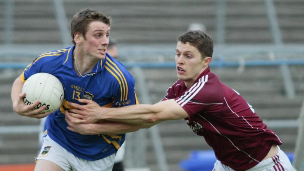 Tipperary’s Conor Sweeney holds off Galway’s Colin Forde