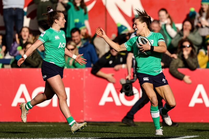 Beibhinn Parsons celebrates after scoring Ireland's fifth try with Molly Scuffil-McCabe. Photograph: Ben Brady/Inpho
