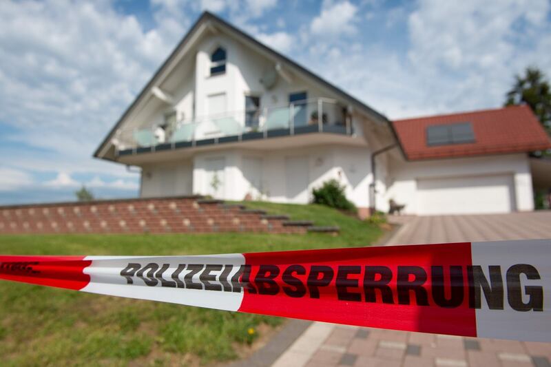 Police tape surrounds the home of Walter Lübcke. Photograpgh: Swen Pförtner/DPA/AFP/Outswen Pfortner/Getty