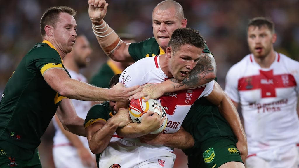 England captain Sam Burgess carries during his side’s World Cup final defeat to Australia. Photograph: Matt King/Getty