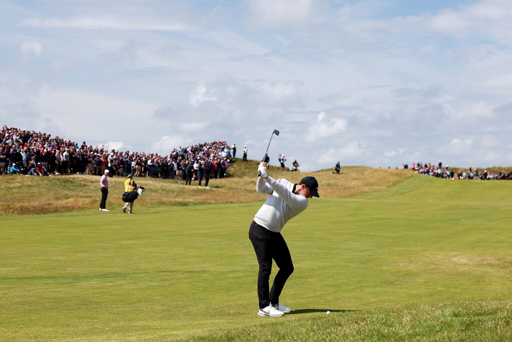 Rory McIlroy plays his second shot on the 12th hole on Day Two of The 151st Open at Royal Liverpool Golf Club. (Photograph: Warren Little/Getty Images