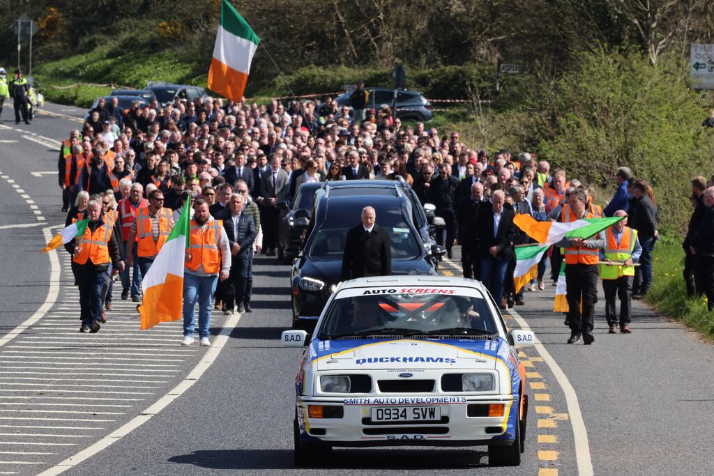 A Ford Sierra rally car leads the funeral cortege of Craig Breen to the Sacred Heart Church in Ferrybank, outside Waterford city, on Tuesday. Photograph: Dara Mac Dónaill